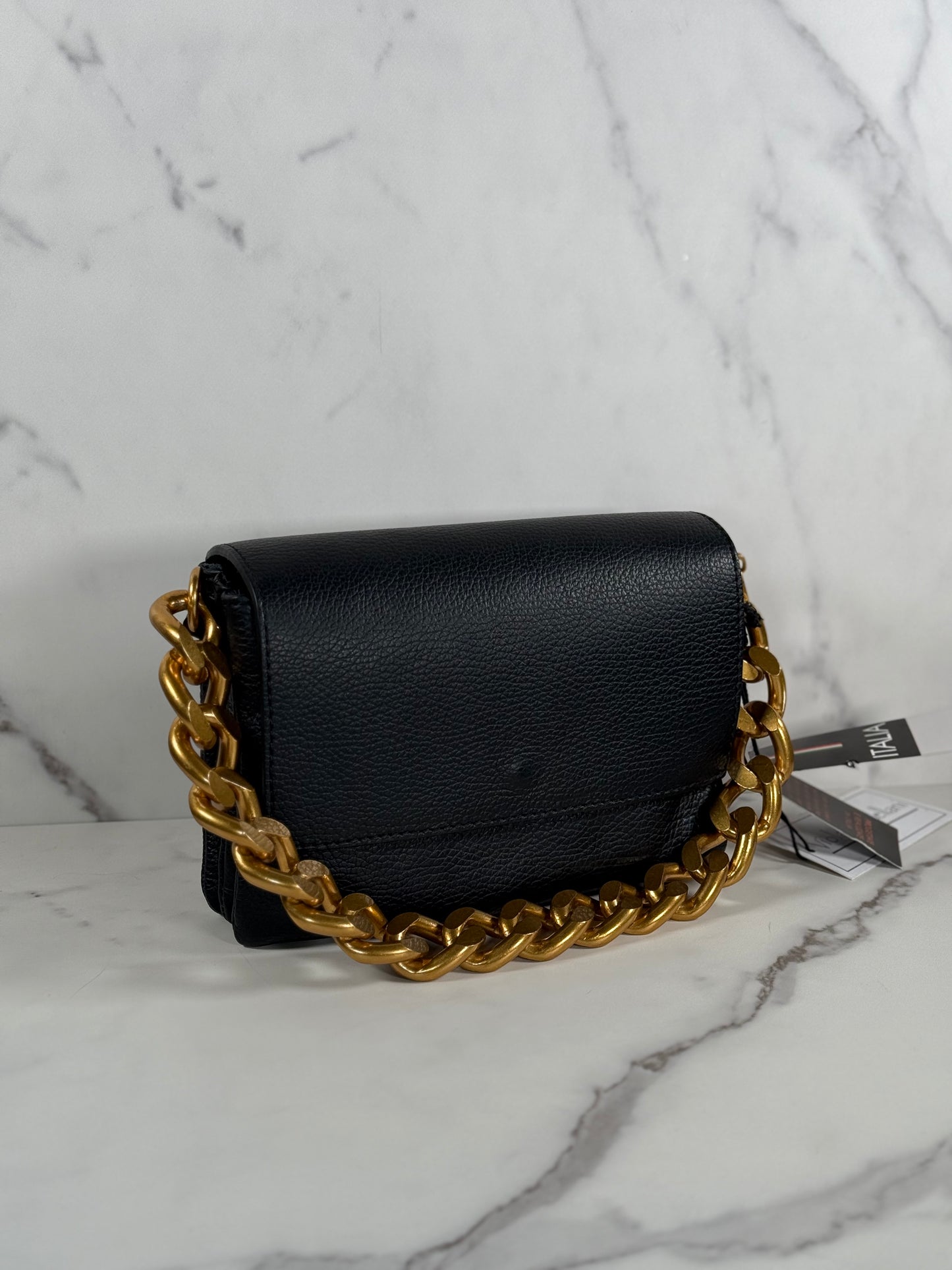 Cartera de mano 100% cuero