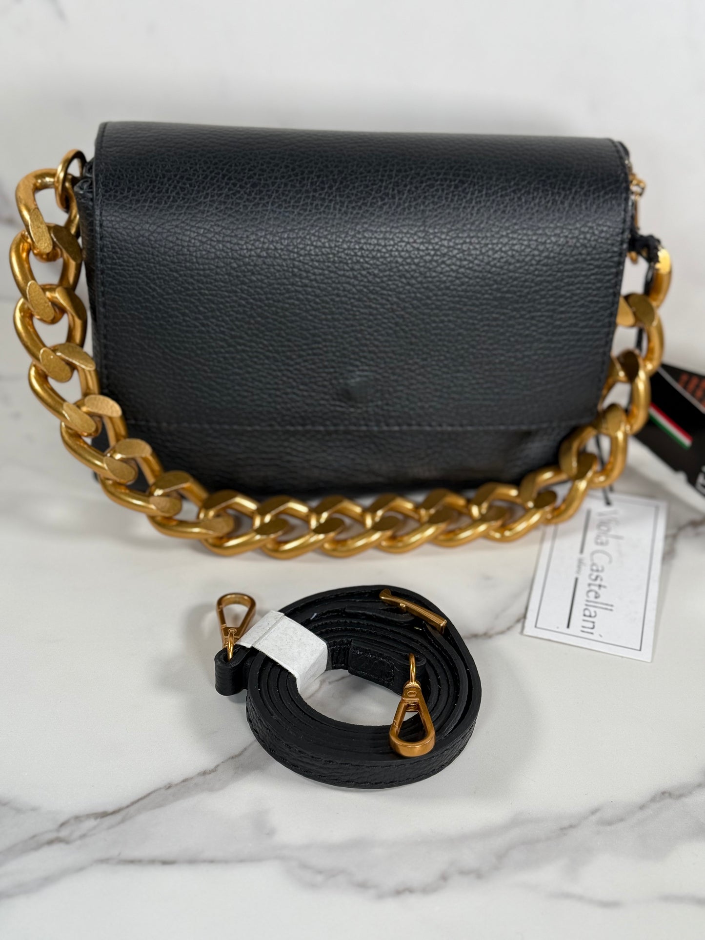 Cartera de mano 100% cuero